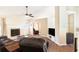 Comfortable living room featuring a fireplace, hardwood floors, and stylish furnishings at 2577 Abbotts Glen Nw Dr, Acworth, GA 30101