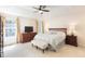 Serene main bedroom featuring large windows, plush carpet, and neutral decor at 2577 Abbotts Glen Nw Dr, Acworth, GA 30101