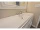 Bathroom with modern vanity, solid surface countertop, and chrome faucet at 3107 Hendrix Circle Sw, Covington, GA 30014