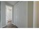 Modern bathroom featuring a shower-tub combo and nearby linen closet at 3107 Hendrix Circle Sw, Covington, GA 30014