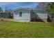Exterior shot of the home with vinyl siding and green lawn at 3107 Hendrix Circle Sw, Covington, GA 30014