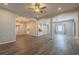 Expansive living space featuring hardwood style floors, access to kitchen and bathroom at 3107 Hendrix Circle Sw, Covington, GA 30014