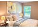 Cozy bedroom showcasing a comfortable bed, soft lighting, and tranquil ambiance at 473 Broder Farms Dr, Stockbridge, GA 30281