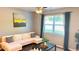 Comfortable living room with modern decor, a plush sofa, and inviting natural light at 473 Broder Farms Dr, Stockbridge, GA 30281