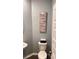 Cozy powder room features a stylish vanity and a motivational wall decor at 473 Broder Farms Dr, Stockbridge, GA 30281