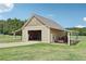 Large, versatile barn with ample open space, perfect for storage or hobbies at 625 Henderson Mill Rd, Covington, GA 30014
