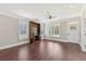 Comfortable living room showcasing hardwood floors, built-in shelving, and natural light at 625 Henderson Mill Rd, Covington, GA 30014