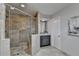Bathroom with walk-in shower and grey vanity with modern hardware at 945 Tiber Cir, Alpharetta, GA 30022