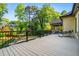 Expansive outdoor back deck overlooking a lush green yard, perfect for relaxing and entertaining at 1556 Gaylor Se Dr, Smyrna, GA 30082