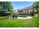 Enjoy a private backyard with a stunning pool and lush landscaping perfect for relaxation and entertainment at 1556 Gaylor Se Dr, Smyrna, GA 30082