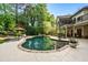Enjoy backyard tranquility with the beautiful pool and lounge chairs, perfect for soaking up the sun and enjoying a quiet escape at 1556 Gaylor Se Dr, Smyrna, GA 30082
