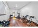 Bright gym featuring multiple exercise machines, a yoga mat, and mirrors at 1556 Gaylor Se Dr, Smyrna, GA 30082