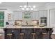 Gourmet kitchen with a large island, granite countertops, stainless steel appliances, and custom cabinetry at 1556 Gaylor Se Dr, Smyrna, GA 30082