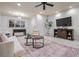 Spacious living room with modern furnishings, a large TV, and ample space for relaxation at 1556 Gaylor Se Dr, Smyrna, GA 30082