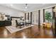 Spacious main bedroom with hardwood floors, lots of windows, and sitting area at 1556 Gaylor Se Dr, Smyrna, GA 30082
