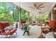 Expansive covered patio with an outdoor kitchen and comfortable seating creates an ideal entertainment space at 1556 Gaylor Se Dr, Smyrna, GA 30082