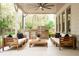 The covered patio features a full outdoor kitchen and comfortable seating, great for entertaining at 1556 Gaylor Se Dr, Smyrna, GA 30082