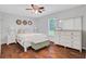 Bright bedroom with hardwood floors and modern furnishings at 1605 Saddlecreek Rd, Auburn, GA 30011