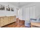 Bright bedroom featuring hardwood floors and natural light at 1605 Saddlecreek Rd, Auburn, GA 30011
