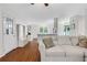 Inviting living room featuring hardwood floors, bright lighting and an open concept layout at 1605 Saddlecreek Rd, Auburn, GA 30011