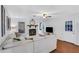 Bright living room with a fireplace, hardwood floors and natural light at 1605 Saddlecreek Rd, Auburn, GA 30011