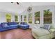 Inviting sunroom with ample windows and hardwood flooring at 1605 Saddlecreek Rd, Auburn, GA 30011