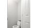 Bathroom with toilet and door at 1668 Macy Ln, Lawrenceville, GA 30043