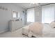 Bedroom features carpet, natural light, dresser, and stylish decor at 1668 Macy Ln, Lawrenceville, GA 30043