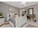 Bedroom with stylish décor, carpet, windows, and a walk in closet at 1668 Macy Ln, Lawrenceville, GA 30043