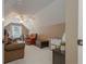 Spacious bonus room with neutral tones, natural light, and inviting furnishings at 1668 Macy Ln, Lawrenceville, GA 30043
