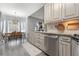 Cozy kitchen with stainless steel appliances, granite countertops, and eat-in breakfast nook at 1668 Macy Ln, Lawrenceville, GA 30043