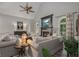 Bright living room with vaulted ceiling, fireplace, and cozy sofas for comfortable living and entertaining at 1668 Macy Ln, Lawrenceville, GA 30043