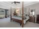 Inviting primary bedroom with a seating area, a ceiling fan, and a private entrance at 1668 Macy Ln, Lawrenceville, GA 30043
