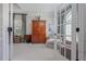 Bright office space with French doors, ample storage, and comfortable seating for focused work or relaxation at 1668 Macy Ln, Lawrenceville, GA 30043
