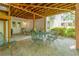 Cozy brick patio with outdoor seating, perfect for enjoying the backyard scenery at 1668 Macy Ln, Lawrenceville, GA 30043