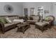 Comfortable screened porch furnished with plush seating and floral accents, creating a cozy retreat at 1668 Macy Ln, Lawrenceville, GA 30043