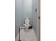 Bright toilet room features updated fixtures, neutral walls, and tile floors at 1668 Macy Ln, Lawrenceville, GA 30043