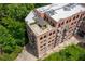 Aerial view of apartment building with roof patio at 3235 Roswell Ne Rd # 702, Atlanta, GA 30305