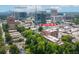 An aerial view of Buckhead Village Lofts in Atlanta, showcasing surrounding businesses and neighborhood at 3235 Roswell Ne Rd # 702, Atlanta, GA 30305