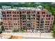 Aerial view of apartment building featuring many windows at 3235 Roswell Ne Rd # 702, Atlanta, GA 30305