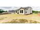 Well-maintained backyard featuring a patio area and ample green space at 3410 Summerpoint Xing, Cumming, GA 30028