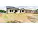Expansive backyard with a lush lawn, perfect for outdoor activities and relaxation at 3410 Summerpoint Xing, Cumming, GA 30028