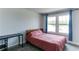 Cozy bedroom with large windows, carpet floors, and ample natural light at 3410 Summerpoint Xing, Cumming, GA 30028
