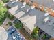 Overhead view of the building exterior featuring a parking lot and green landscape at 705 Beaufort Cir, Duluth, GA 30096