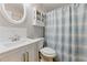 Clean and bright bathroom with modern fixtures, a vanity with storage, and a shower-tub combination at 2031 Dennis Pl, Buford, GA 30519