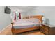 Spacious main bedroom featuring hardwood floors and plenty of natural light at 2031 Dennis Pl, Buford, GA 30519