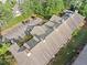 Aerial shot featuring the well-maintained roof and parking area of a brick apartment building at 717 Beaufort Cir, Duluth, GA 30096