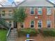 Brick exterior of apartment building with a handicap parking sign in front at 717 Beaufort Cir, Duluth, GA 30096