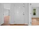 Entrance foyer view with hardwood floors and access to other rooms at 717 Beaufort Cir, Duluth, GA 30096