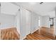 Foyer area featuring hardwood floors, a closet, and access to the kitchen at 717 Beaufort Cir, Duluth, GA 30096